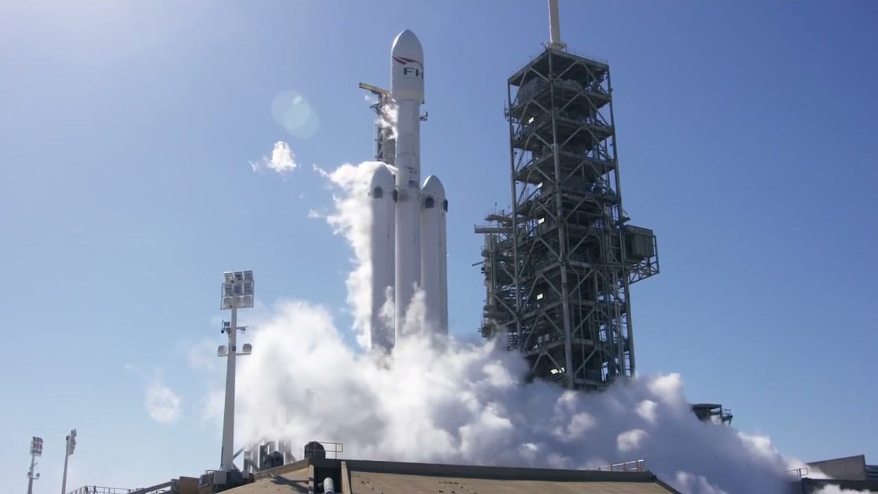 Falcon Heavy standing on the pad during SpaceX's official demo static-fire test.