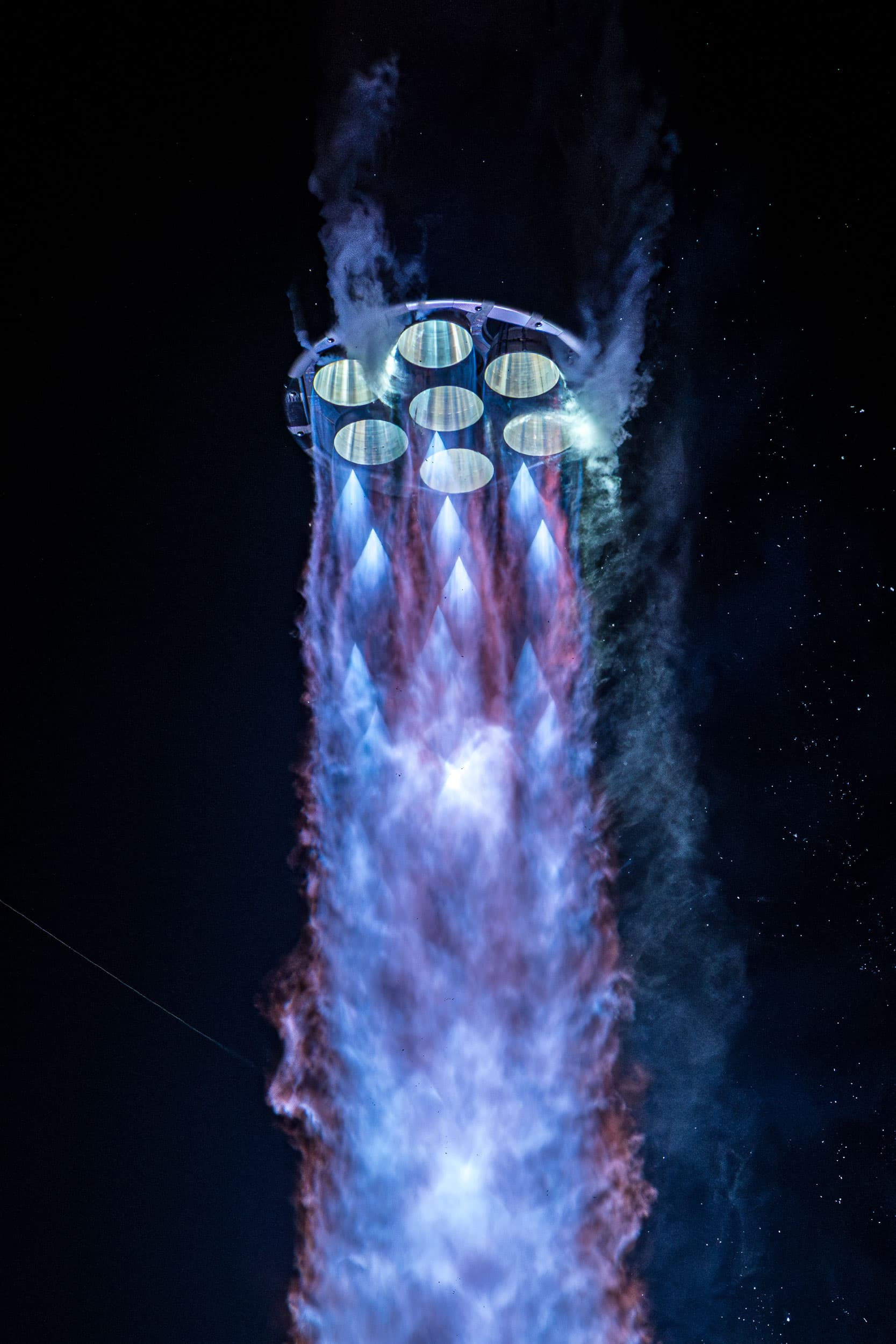 Blue Origin's New Glenn booster engines firing during flight.